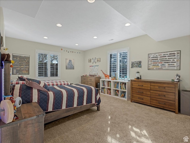 bedroom with recessed lighting and carpet