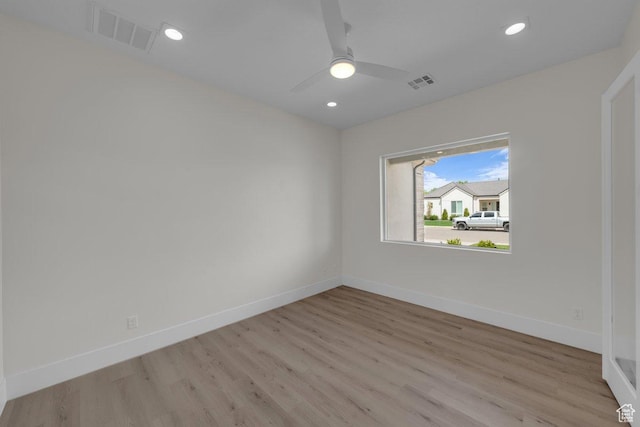 39 W Elinor Ln, Washington, UT 84780 - empty room featuring wood finished floors, baseboards, and visible vents