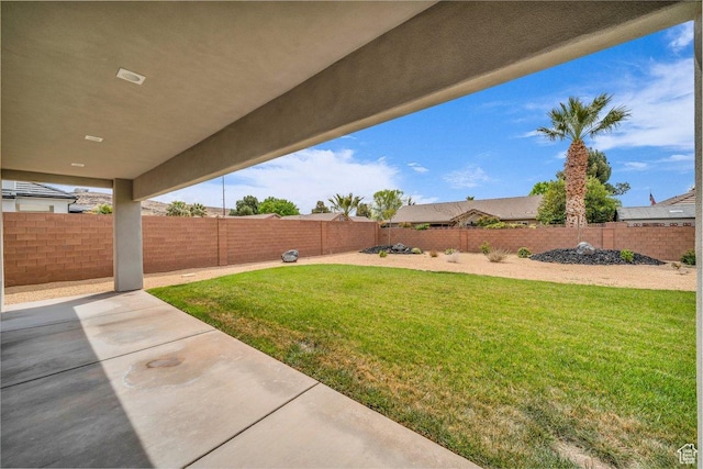39 W Elinor Ln, Washington, UT 84780 - view of yard featuring a fenced backyard and a patio