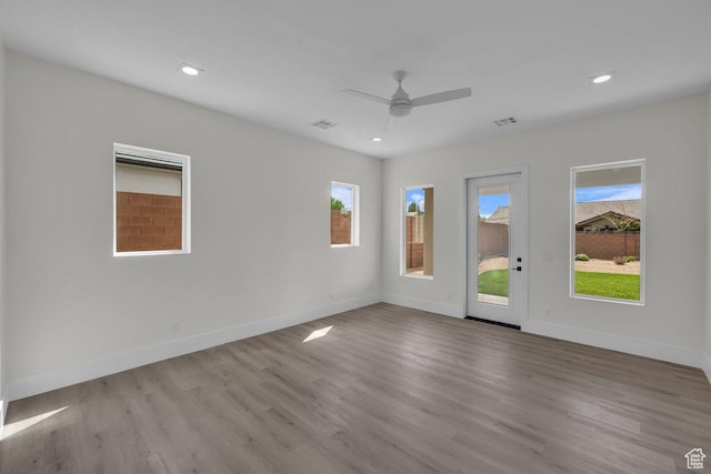 39 W Elinor Ln, Washington, UT 84780 - unfurnished room featuring ceiling fan, visible vents, recessed lighting, wood finished floors, and baseboards