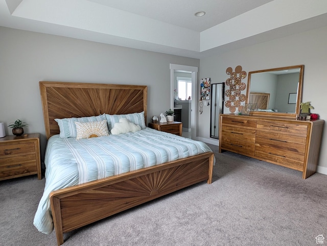 carpeted bedroom with baseboards