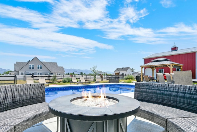 2282 N 3430 W, Clinton, UT 84015 - view of pool featuring a gazebo, a mountain view, and an outdoor fire pit