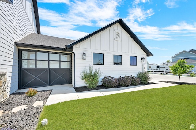 2282 N 3430 W, Clinton, UT 84015 - modern farmhouse style home featuring board and batten siding and a front lawn