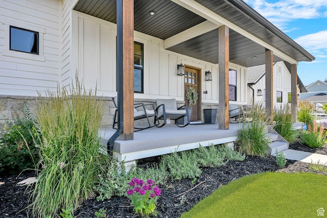 2282 N 3430 W, Clinton, UT 84015 - entrance to property featuring covered porch and board and batten siding