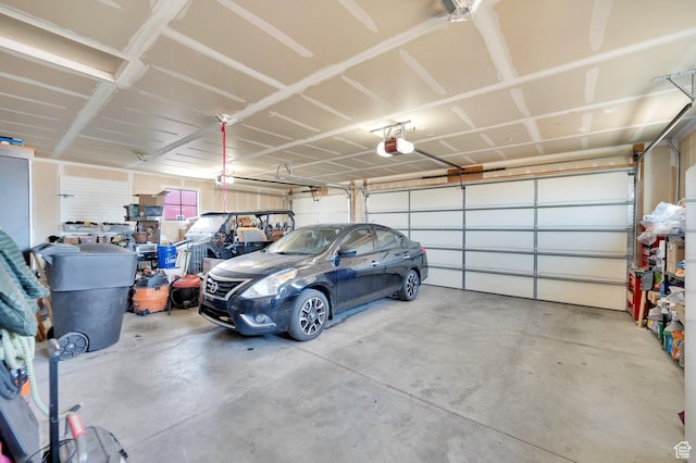 2282 N 3430 W, Clinton, UT 84015 - garage featuring a garage door opener