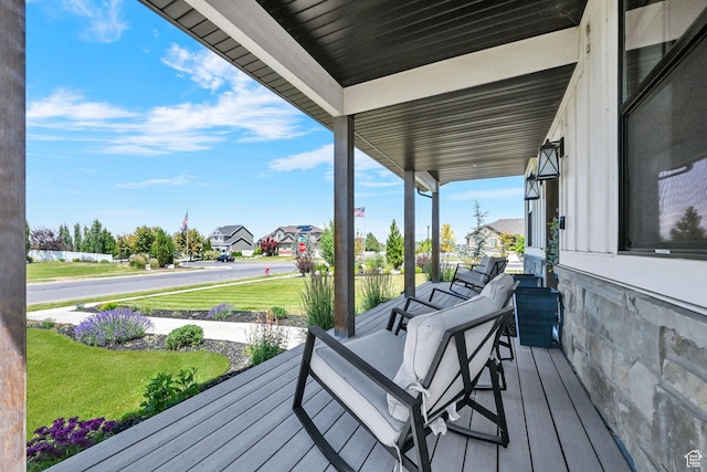 2282 N 3430 W, Clinton, UT 84015 - porch with a residential view and a lawn