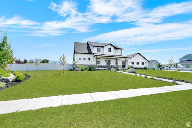 2282 N 3430 W, Clinton, UT 84015 - modern farmhouse style home featuring a porch and board and batten siding