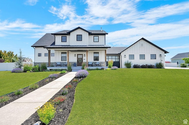 2282 N 3430 W, Clinton, UT 84015 - modern inspired farmhouse with board and batten siding, covered porch, a standing seam roof, and a metal roof