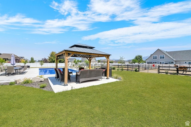 2282 N 3430 W, Clinton, UT 84015 - fenced backyard with a patio, a gazebo, and an outdoor hangout area