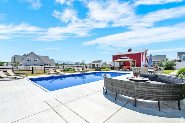 2282 N 3430 W, Clinton, UT 84015 - view of pool featuring a patio and an outdoor living space with a fire pit