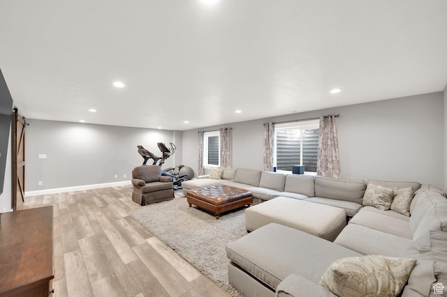 2282 N 3430 W, Clinton, UT 84015 - living area with a barn door, light wood-type flooring, and recessed lighting