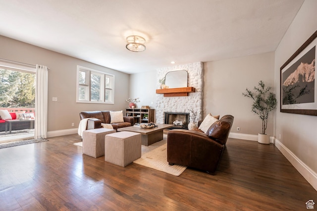 872 Martingale Ln, Park City, UT 84098 - living room featuring a fireplace, dark wood-style flooring, and baseboards