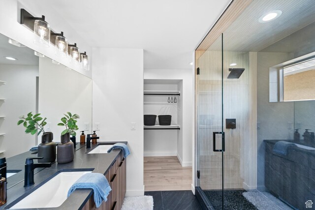 707 E 9th Ave, Salt Lake City, UT 84103 - bathroom with a stall shower, double vanity, a sink, and recessed lighting