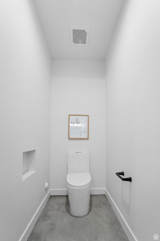 707 E 9th Ave, Salt Lake City, UT 84103 - bathroom with concrete floors, visible vents, baseboards, and toilet