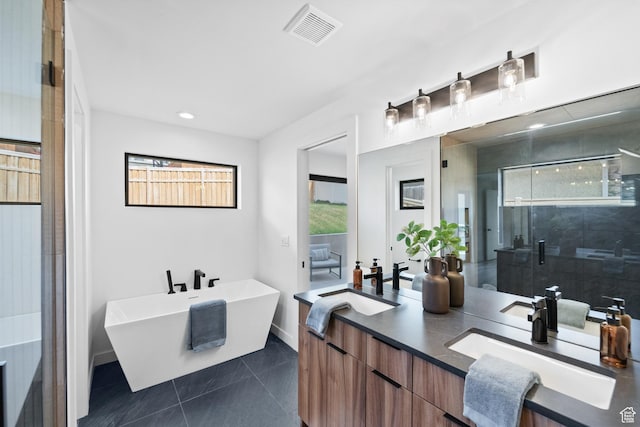 707 E 9th Ave, Salt Lake City, UT 84103 - bathroom with a sink, visible vents, a shower stall, and plenty of natural light