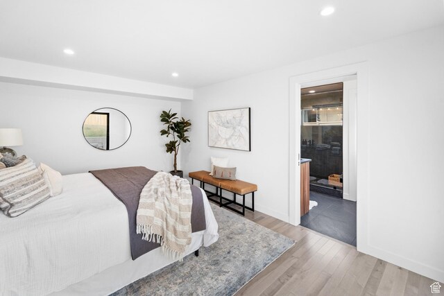 707 E 9th Ave, Salt Lake City, UT 84103 - bedroom with recessed lighting, baseboards, and wood finished floors