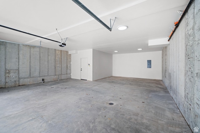 707 E 9th Ave, Salt Lake City, UT 84103 - garage with electric panel and a garage door opener