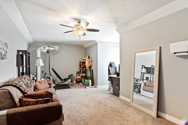 living area featuring ceiling fan, a textured ceiling, carpet flooring, an AC wall unit, and baseboards