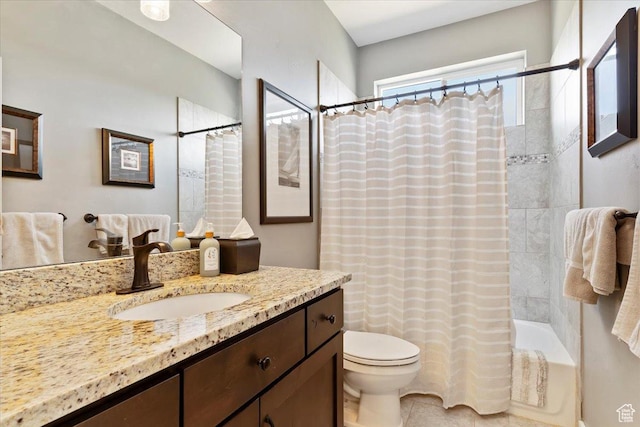 full bath featuring tile patterned flooring, shower / tub combo, vanity, and toilet