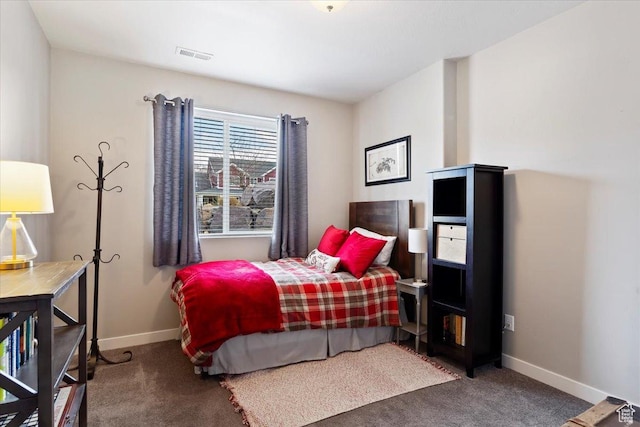 bedroom featuring carpet, visible vents, and baseboards