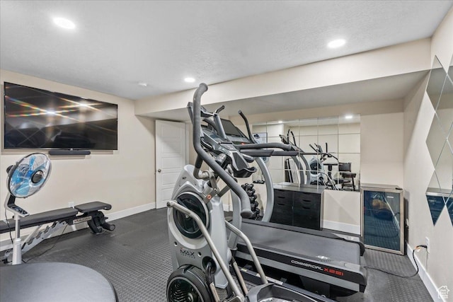 2913 S Puddle Ln, Saratoga Springs, UT 84045 - exercise area featuring baseboards, recessed lighting, and a textured ceiling