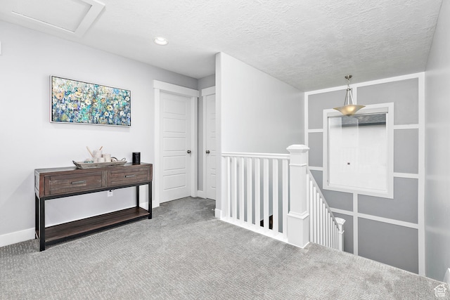 2913 S Puddle Ln, Saratoga Springs, UT 84045 - corridor with recessed lighting, an upstairs landing, baseboards, a textured ceiling, and carpet flooring