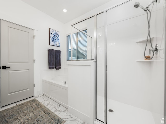 667 S Meade St, Mapleton, UT 84664 - bathroom with recessed lighting, marble finish floor, a stall shower, and a garden tub