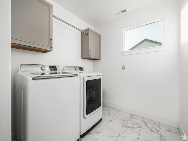 667 S Meade St, Mapleton, UT 84664 - laundry area with baseboards, visible vents, cabinet space, marble finish floor, and washing machine and clothes dryer
