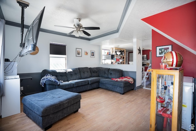 190 S Broadway St, Tooele, UT 84074 - living room with wood finished floors, a textured ceiling, crown molding, and ceiling fan