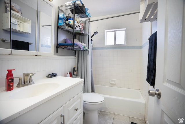 190 S Broadway St, Tooele, UT 84074 - full bath featuring shower / bathtub combination with curtain, vanity, tile patterned flooring, toilet, and wainscoting