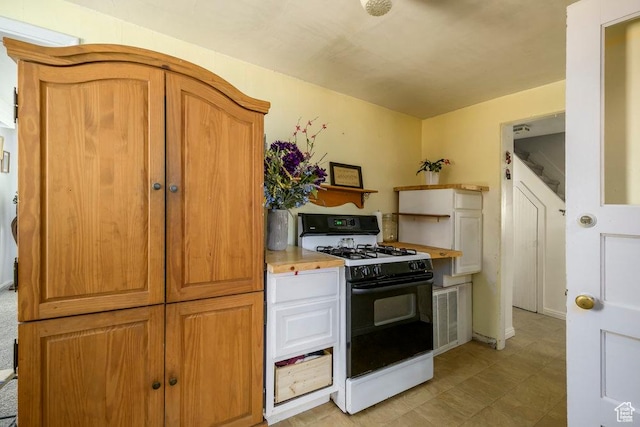 12640 S 1565 E, Draper, UT 84020 - kitchen with visible vents, light countertops, and gas stove