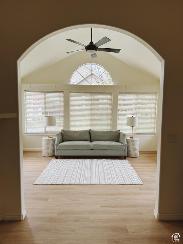 374 N 1100 E Unit F3, Lehi, UT 84043 - living room with lofted ceiling, a ceiling fan, wood finished floors, and arched walkways
