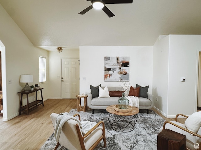 374 N 1100 E Unit F3, Lehi, UT 84043 - living room with arched walkways, light wood-type flooring, a ceiling fan, and baseboards