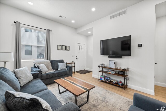 3567 N Lakeview Ct, Eden, UT 84310 - living room with visible vents, baseboards, and wood finished floors