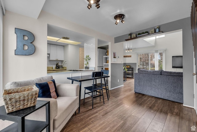 490 E Tonalea Dr, Murray, UT 84107 - living area featuring hardwood / wood-style floors and baseboards