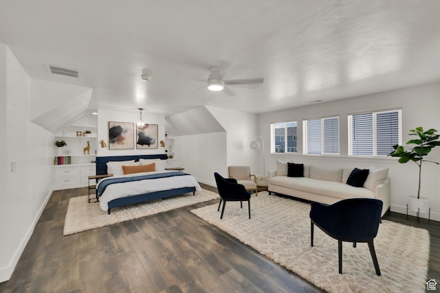 bedroom featuring visible vents, baseboards, and dark wood-style floors