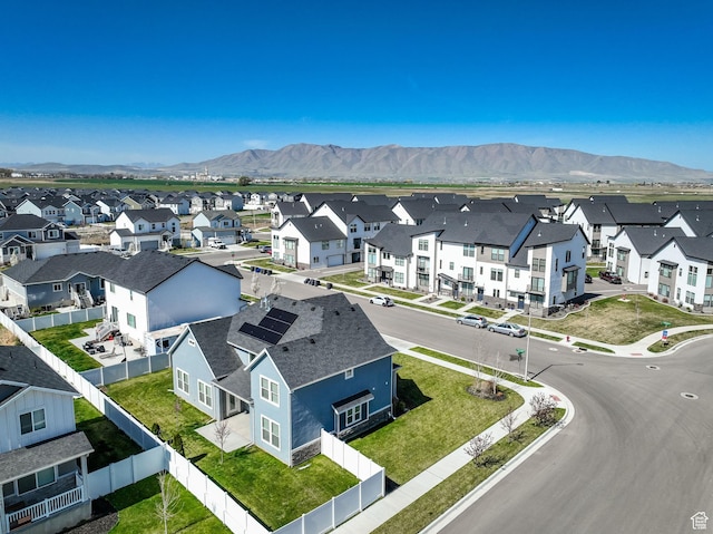 aerial view featuring a mountain view and a residential view