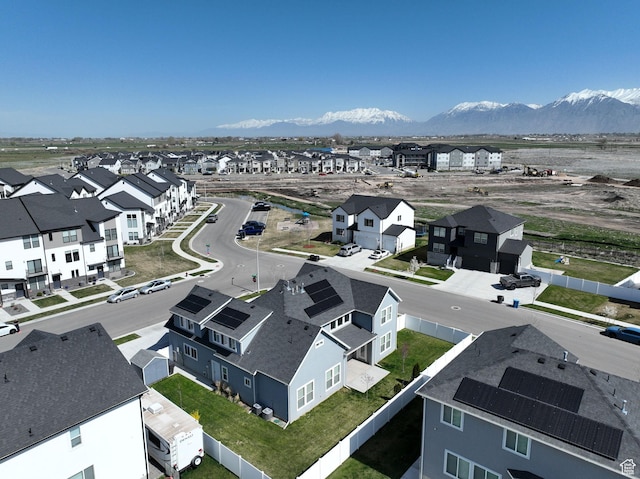 bird's eye view featuring a mountain view and a residential view