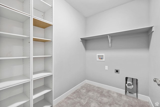 10609 S Kestrel Rise Rd, South Jordan, UT 84009 - clothes washing area featuring laundry area, hookup for an electric dryer, washer hookup, and baseboards