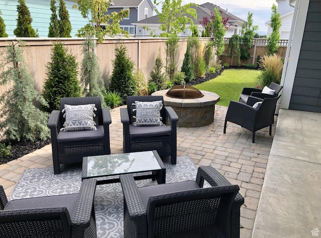 10609 S Kestrel Rise Rd, South Jordan, UT 84009 - view of patio / terrace featuring an outdoor living space with a fire pit and a fenced backyard