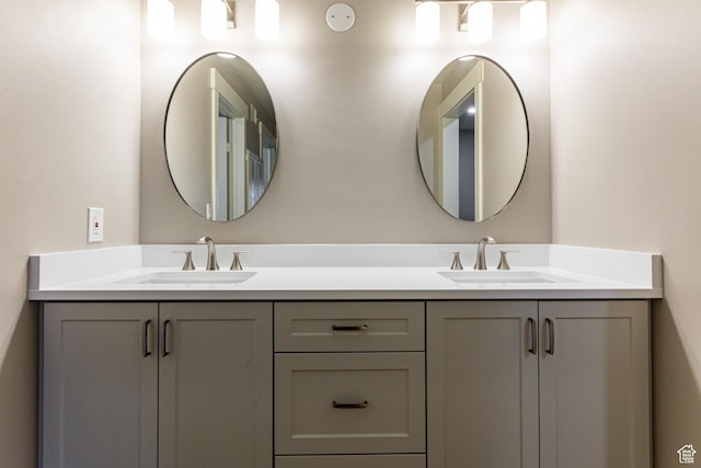 2710 S Highland Dr Unit 11, Salt Lake City, UT 84106 - bathroom featuring double vanity and a sink