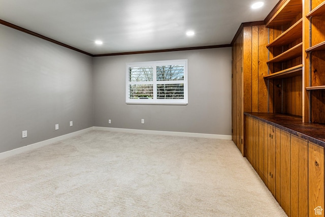 2710 S Highland Dr Unit 11, Salt Lake City, UT 84106 - spare room with baseboards, recessed lighting, light colored carpet, and crown molding