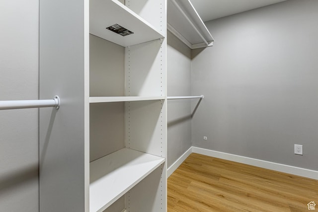 2710 S Highland Dr Unit 11, Salt Lake City, UT 84106 - spacious closet with light wood-style floors and visible vents