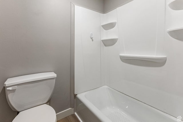 2710 S Highland Dr Unit 11, Salt Lake City, UT 84106 - bathroom with toilet, baseboards, wood finished floors, and walk in shower