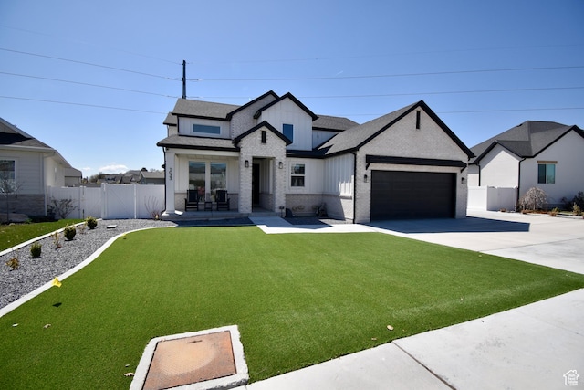 modern inspired farmhouse with driveway, a front lawn, brick siding, a garage, and fence