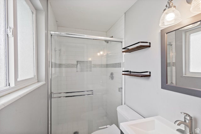 1322 N Main St, Centerville, UT 84014 - bathroom featuring toilet, a sink, and a shower stall