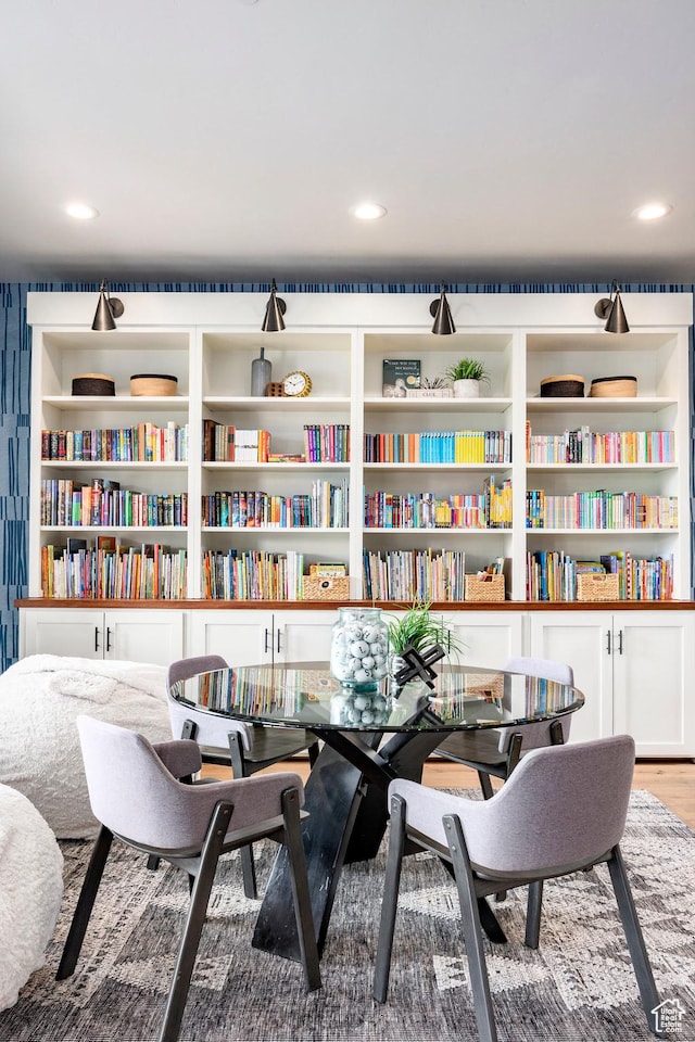 1285 N Oquirrh Mountain Dr, Heber City, UT 84032 - sitting room with recessed lighting, bookshelves, and wood finished floors