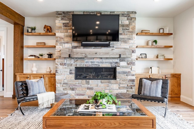 1285 N Oquirrh Mountain Dr, Heber City, UT 84032 - living room with recessed lighting, baseboards, wood finished floors, and a fireplace