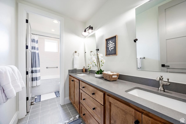 1285 N Oquirrh Mountain Dr, Heber City, UT 84032 - bathroom with shower / bath combo with shower curtain, double vanity, a sink, and baseboards