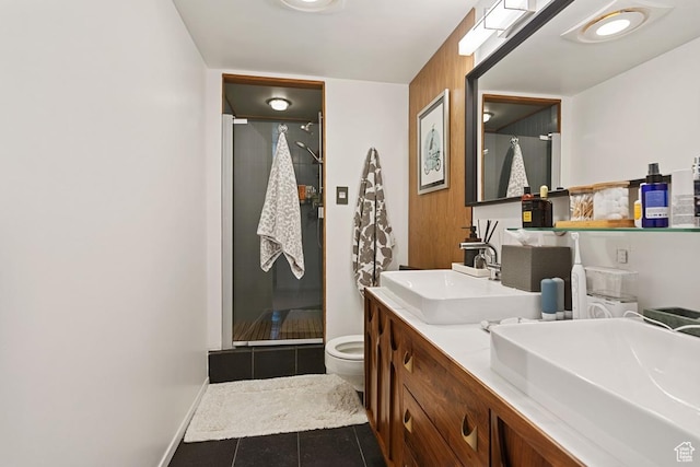 515 S 1000 E Unit 504, Salt Lake City, UT 84102 - bathroom with toilet, tile patterned floors, a sink, and a stall shower
